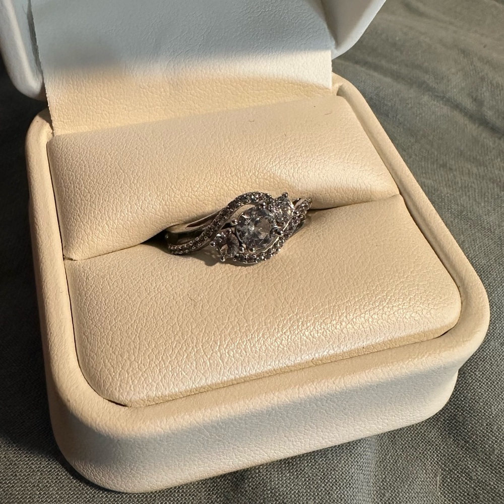 Sterling silver ring with white stones